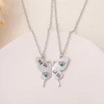 collier élégant soeurs papillon