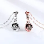 collier tendance musique casque