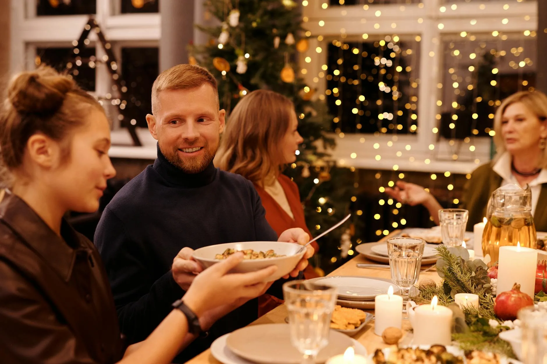 family celebrating christmas dinner